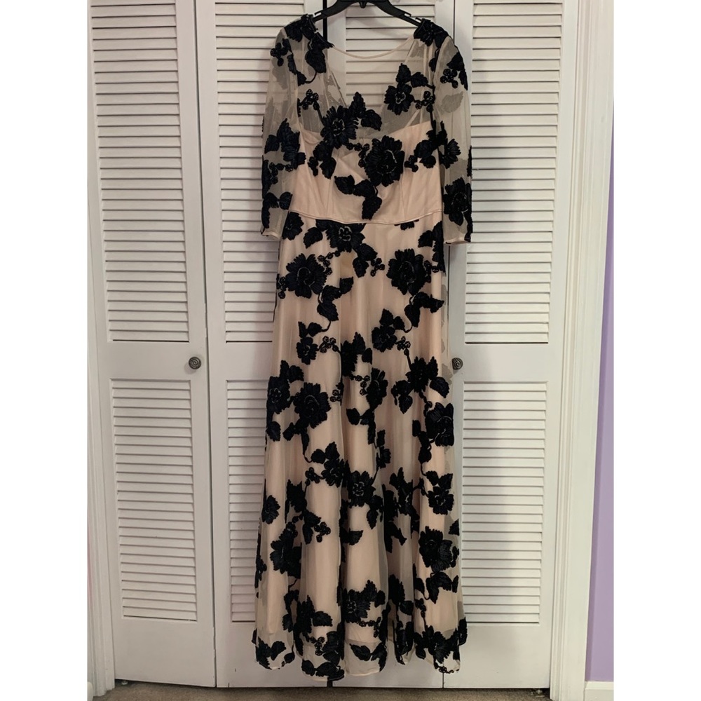 Tahari nude and black gown with bateau neckline